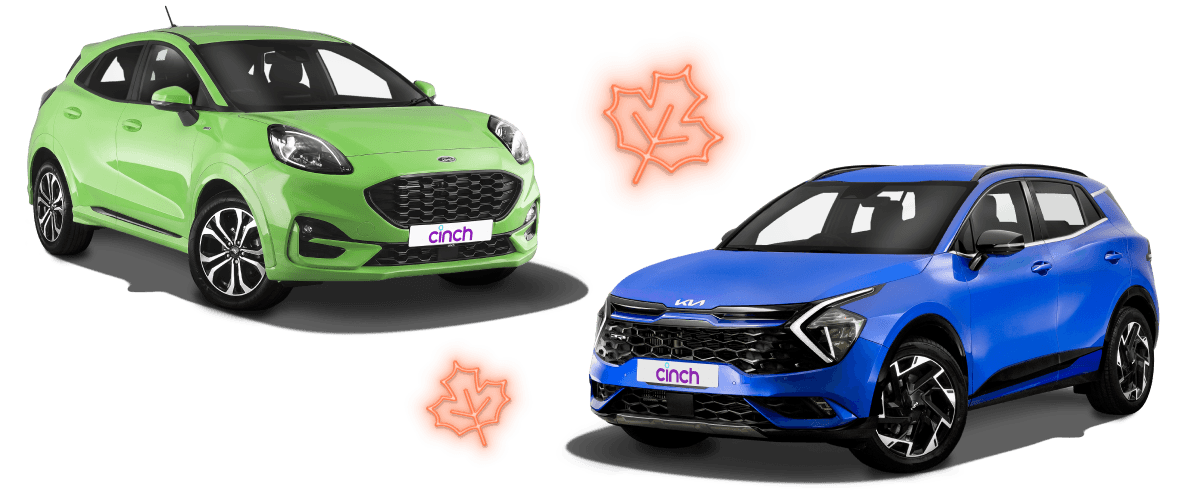 A green car and a blue car are placed against a black background, adorned with orange, leaf-shaped designs.