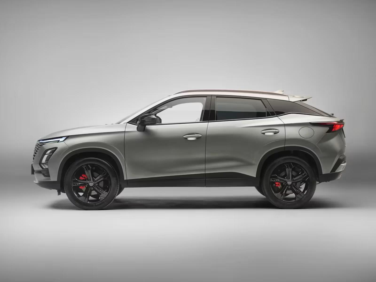 Silver OMODA 5 SHS Hybrid SUV side view with a plain grey background