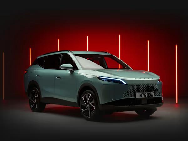 OMODA 7 SUV in front of red neon lights